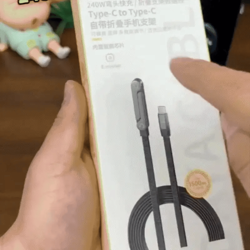 Câble de chargement pliable avec support de téléphone intégré