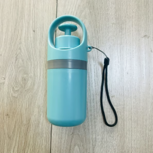 Ramasse-déjections canines portable avec distributeur de sacs intégré