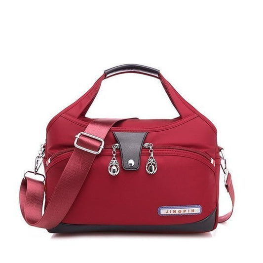 Sac bandoulière antivol multipoches en nylon pour femme