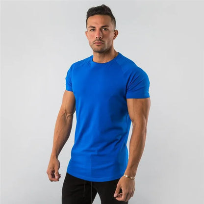 T-shirt de sport à manches raglan et col rond pour homme