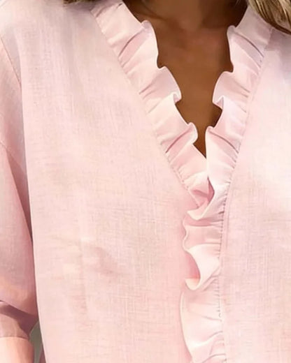Chemisier à col en V et volants en mélange de coton à manches longues pour femme