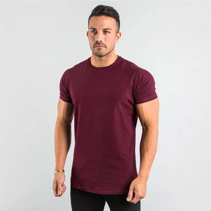 T-shirt de sport à manches raglan et col rond pour homme