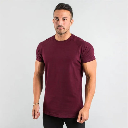 T-shirt de sport à manches raglan et col rond pour homme