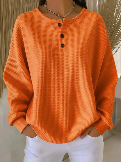 Haut texturé à col boutonné pour femme