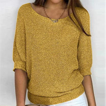 Pull uni à col rond et manches 3/4