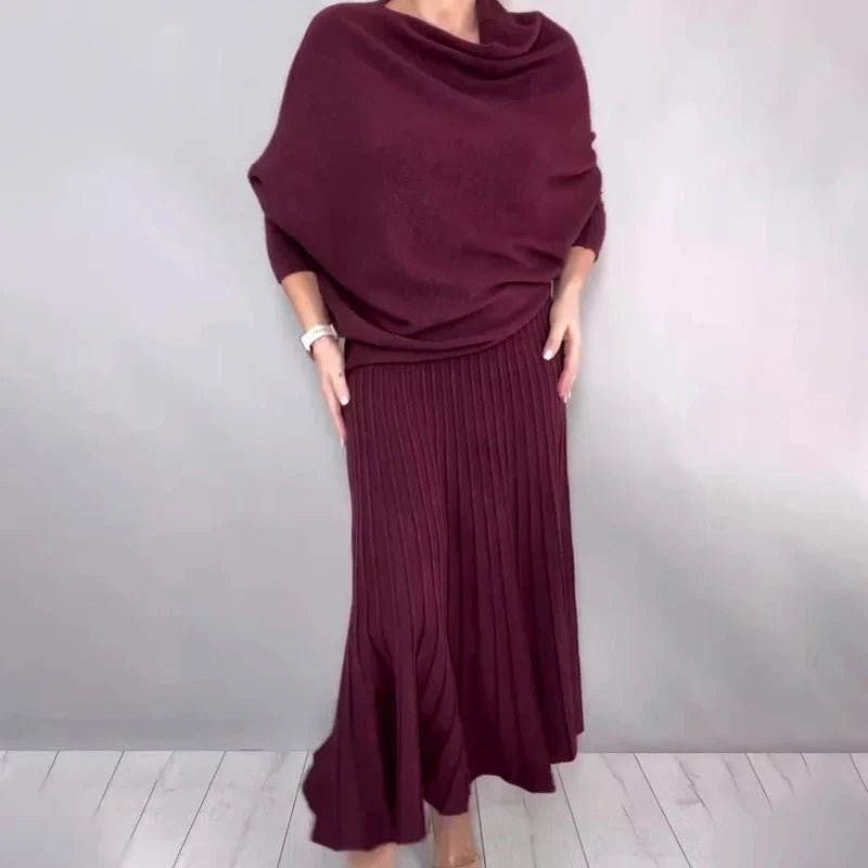 Ensemble composé d'un haut en tricot à col roulé et d'une jupe longue plissée évasée pour femme